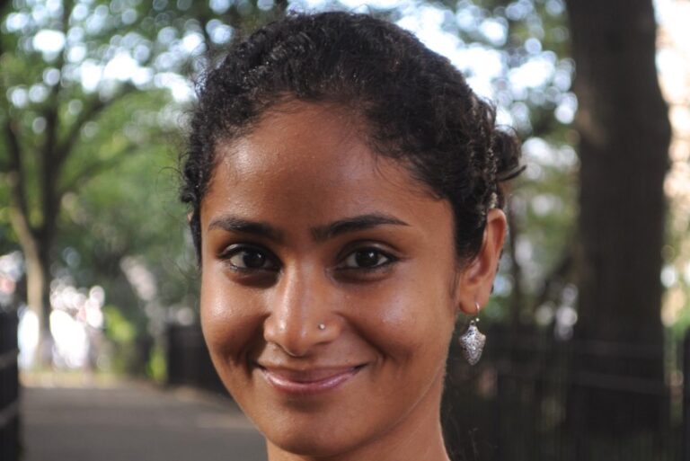 Headshot of Divya Cherian